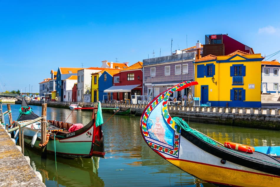 Traditional boats on the canal in Aveiro, Portugal. 