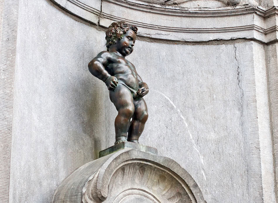Famous statue of The Manneken Pis, Brussels, Belgium
